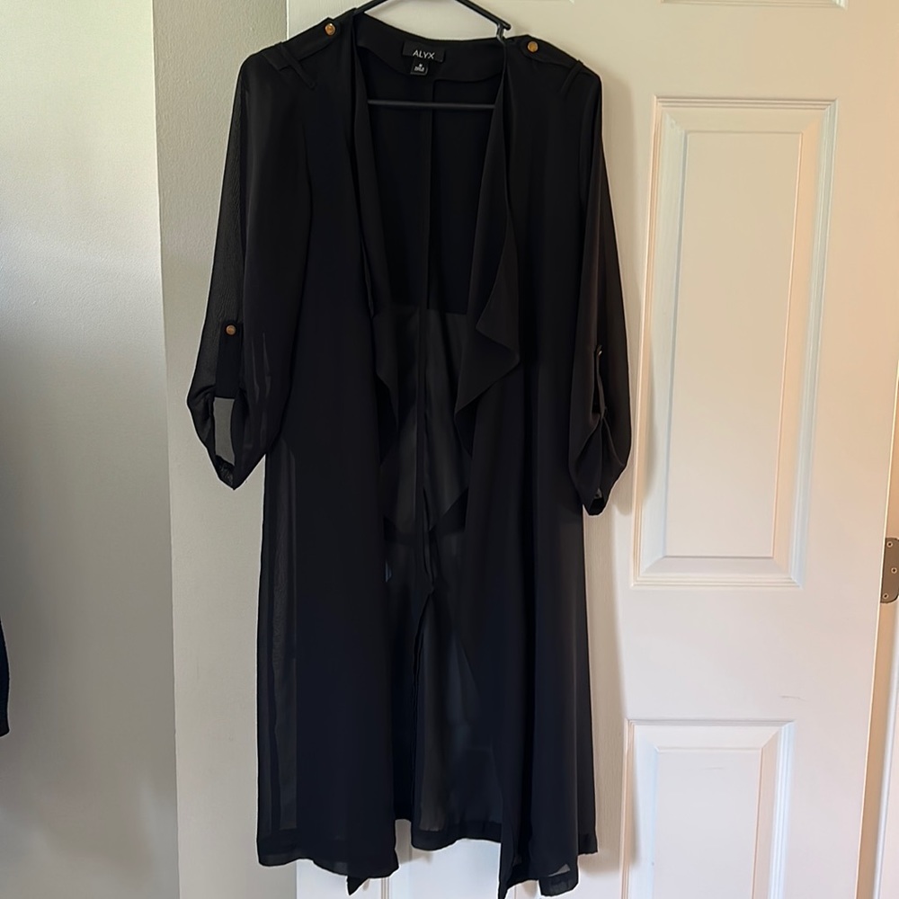 Sheer duster/cape in black. Size medium. Three fourths sleeves.